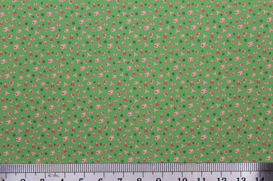 FABRIC  Christmas, ginger gloves & socks green background.