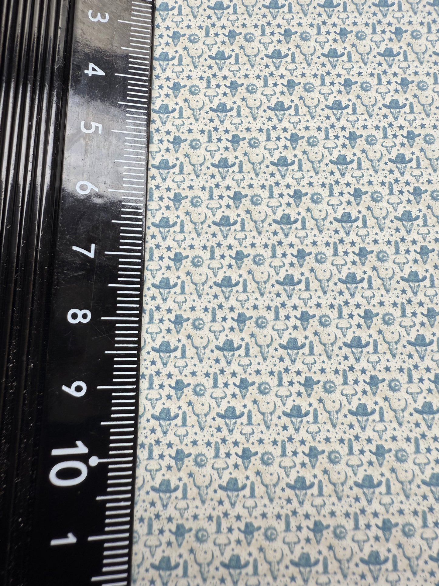 Wallpaper Wild west steers head blue & cream