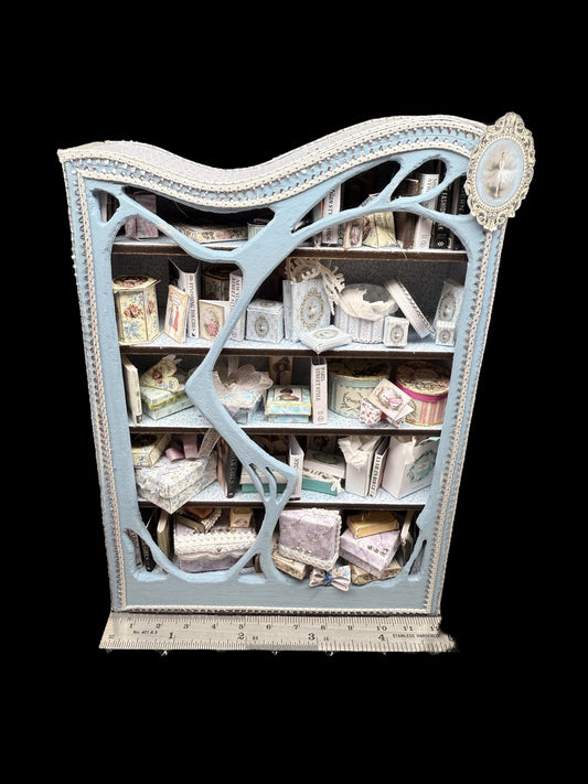 Bookcase/showcase with fashion items included. 1/12th scale OOAK
