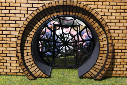 Building supplies. WALL WITH CIRCULAR GATE-COBWEB & SPIDER. 1/48th scale kit