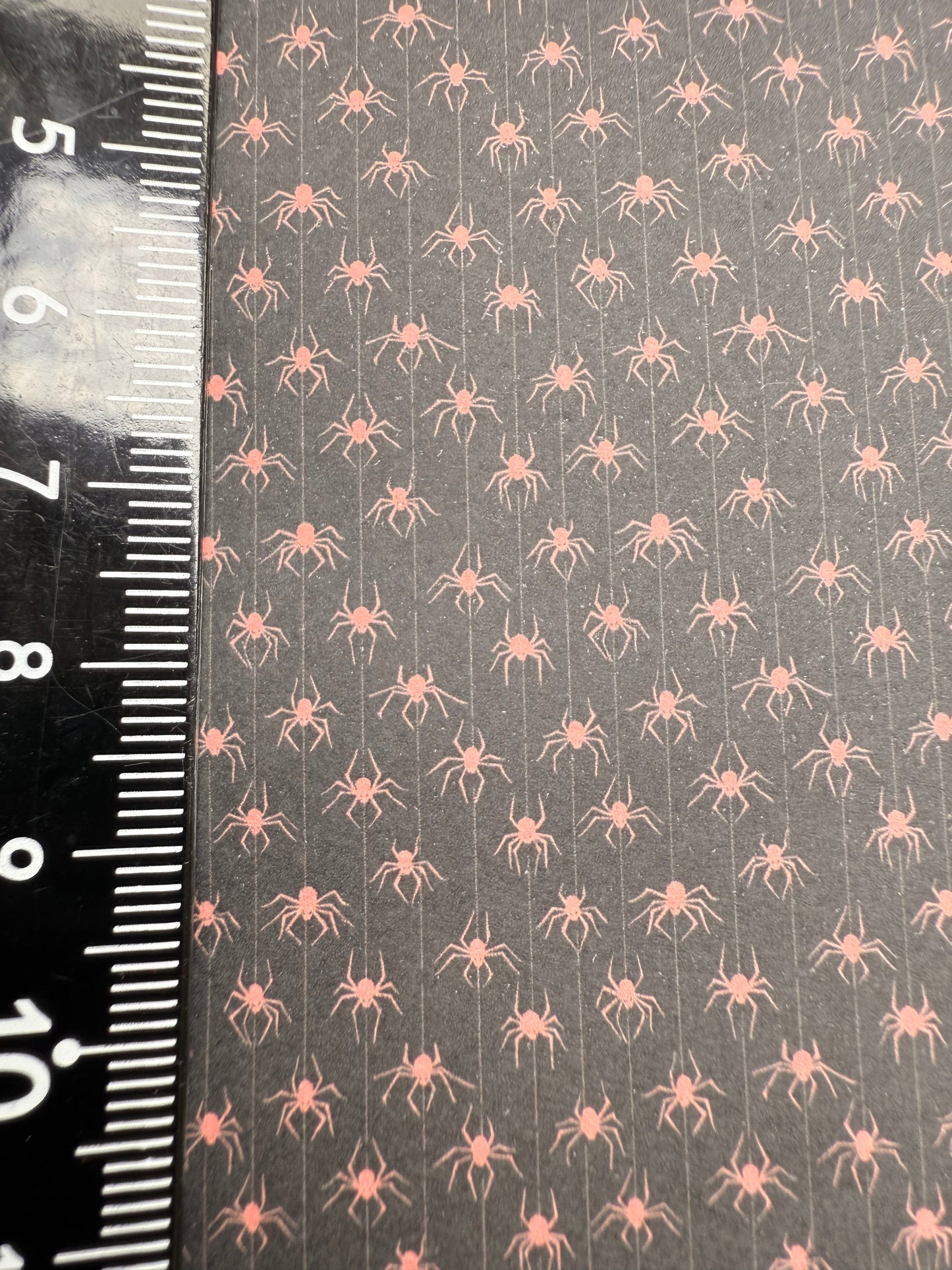 Wallpaper  halloween red & black dangling spiders